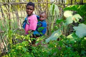 Maria, the single mother of 6, has miraculously planted a vegetable garden beside her mud house.