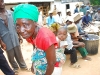 grandmother-and-child-getting-food-assistance-at-iris-africa