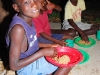 khembo-enjoying-his-evening-meal-at-iris-africa-bangula