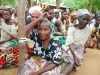 the-elderly-patiently-wait-in-hot-sun-for-food-assistance