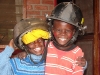 iris-kids-with-firefighter-helmets