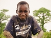 iris-boy-poses-between-the-baobab-trees