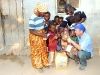 david-morrison-presenting-rice-food-to-ntchayi-family