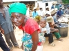 q-grandmother-and-child-getting-food-assistance-at-iris-africa